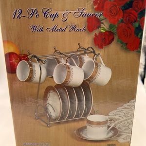 12 pieces: coffee cups and saucers on metal rack